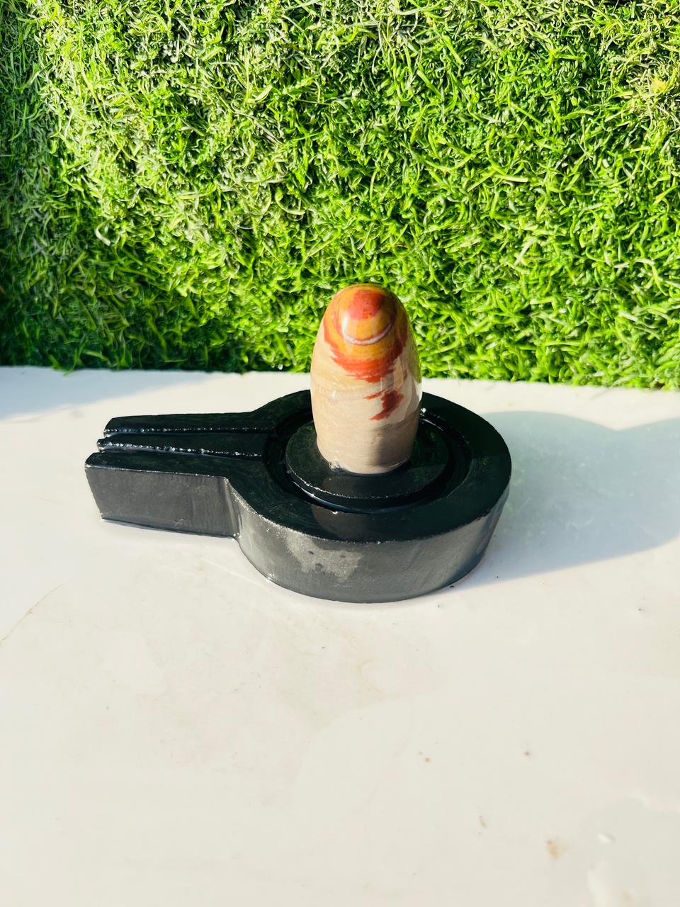 Sacred Trishul Pattern Narmadeshwar Shivling with Black Yoni Base